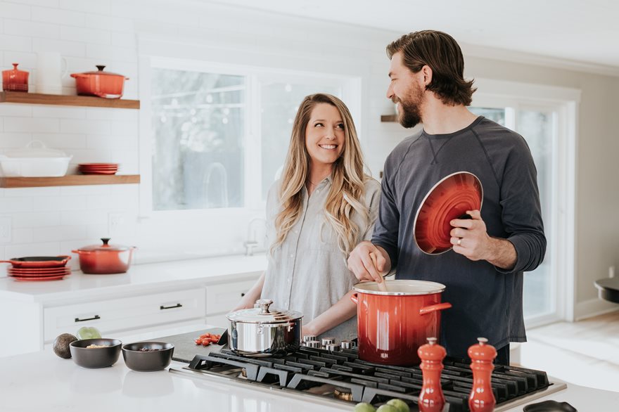 becca-tapert-2wq0ReWAM8I-unsplash.jpg Family cooking in a well-ventilated kitchen