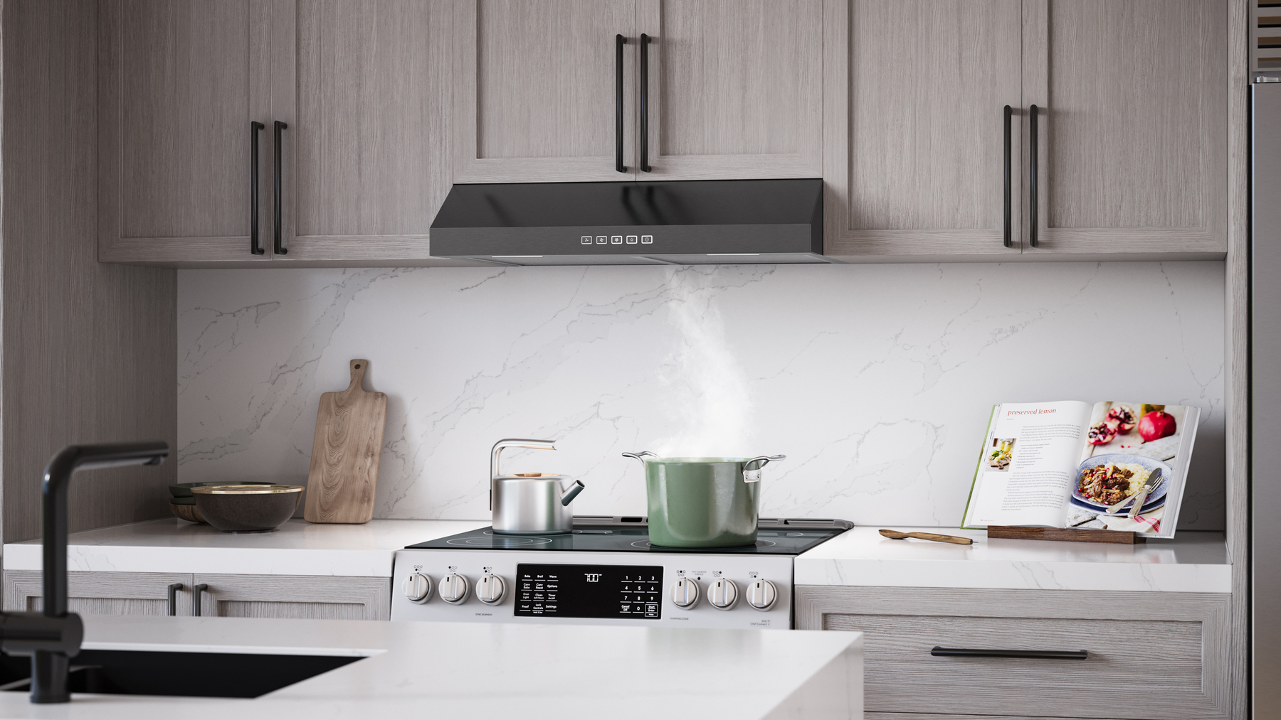 Undercabinet range hood installed beneath kitchen cabinets