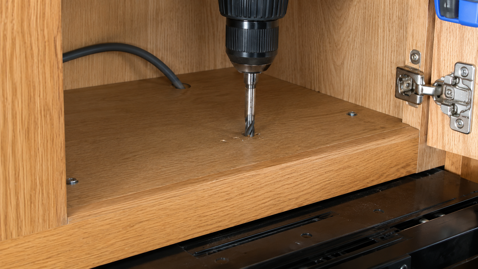 Removing support screws from an over-the-range microwave