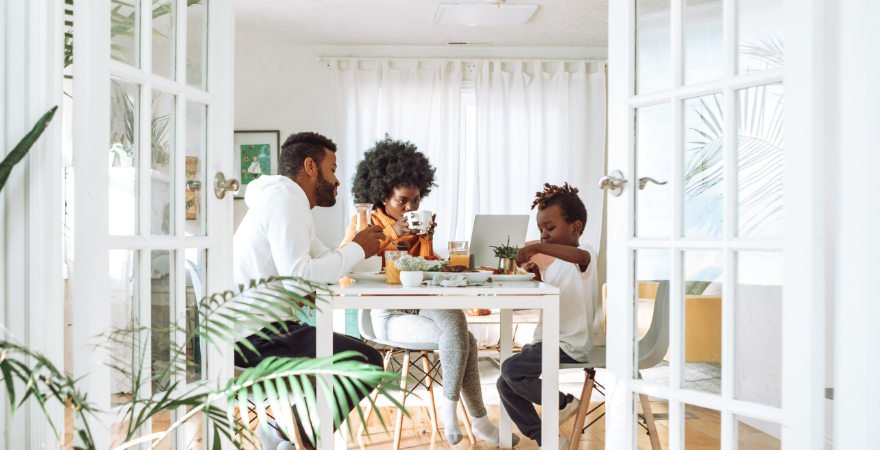 Family having a meal at a table