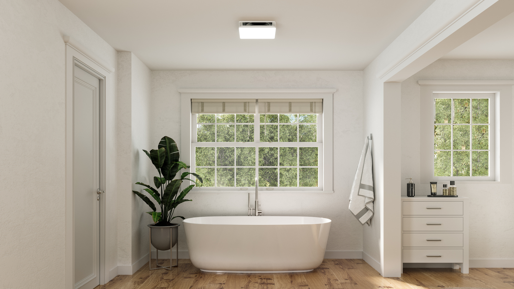bathroom fan with light installed in a finished bathroom